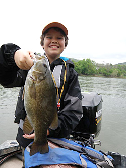 Dakota with a smallmouth bass